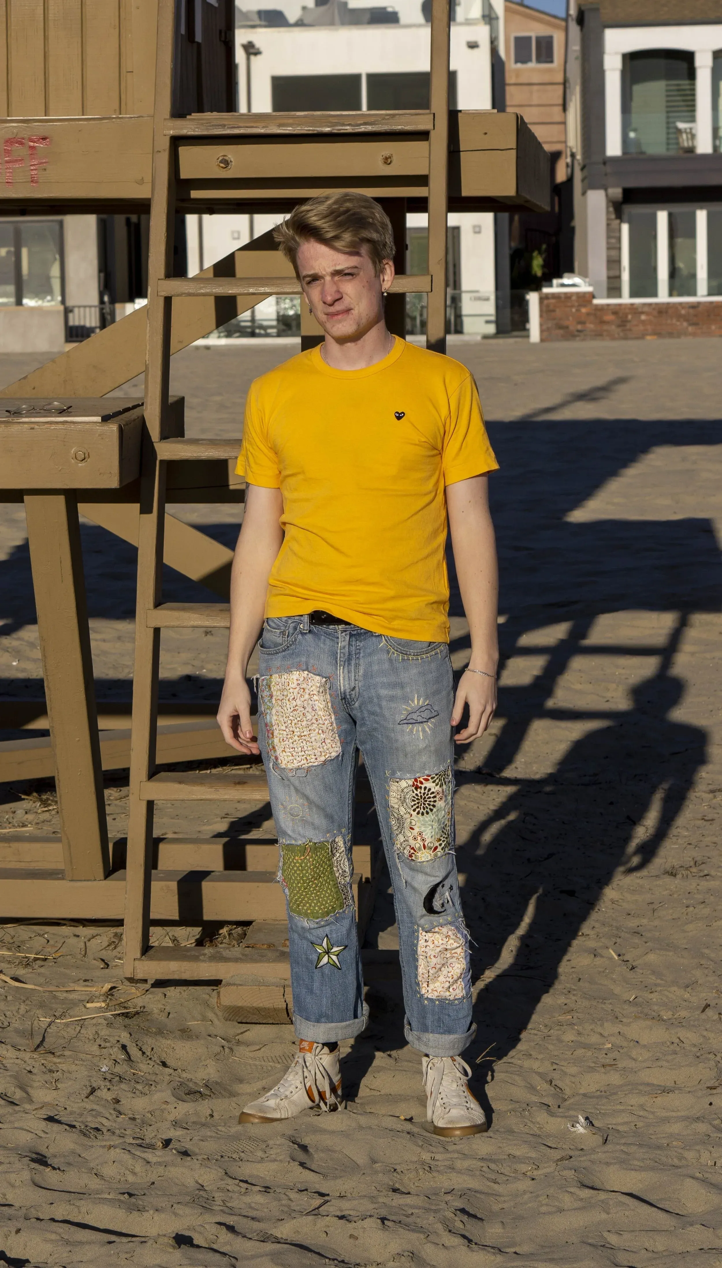 saverio in a yellow shirt at the beach